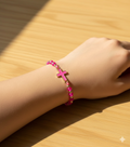 Pulsera Cruz Fucsia